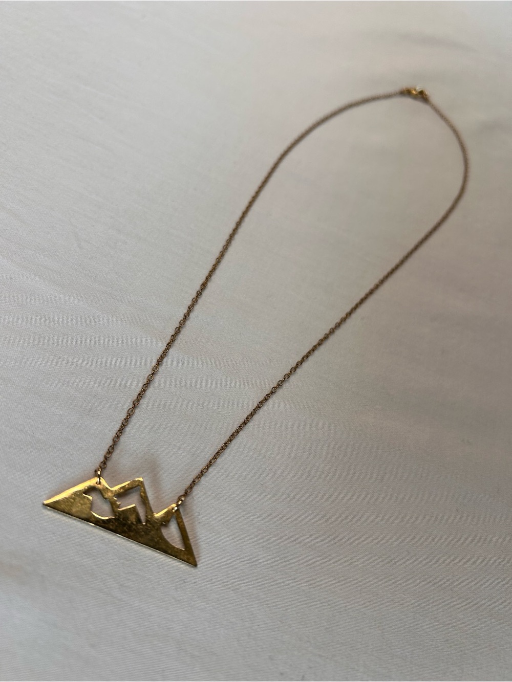 Gold Tone Mountain Range Pendant Necklace